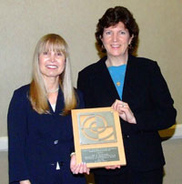 MAS co-directors Lillian Glickman and Ellen Birchander with award 